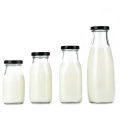 Hot sale 200ml round empty glass milk bottle with screw metal lid